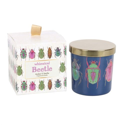 Whimsical beetle-themed Amber and Vanilla scented candle with a navy blue jar, colorful beetle design, and a gold lid, paired with a matching decorative box. Amber and vanilla fragrance, perfect for unique home decor and gifting.
