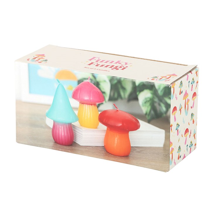 Set of 3 colourful mushroom-shaped candles in pink, turquoise, and orange, perfect for whimsical home decor or unique gift ideas.
