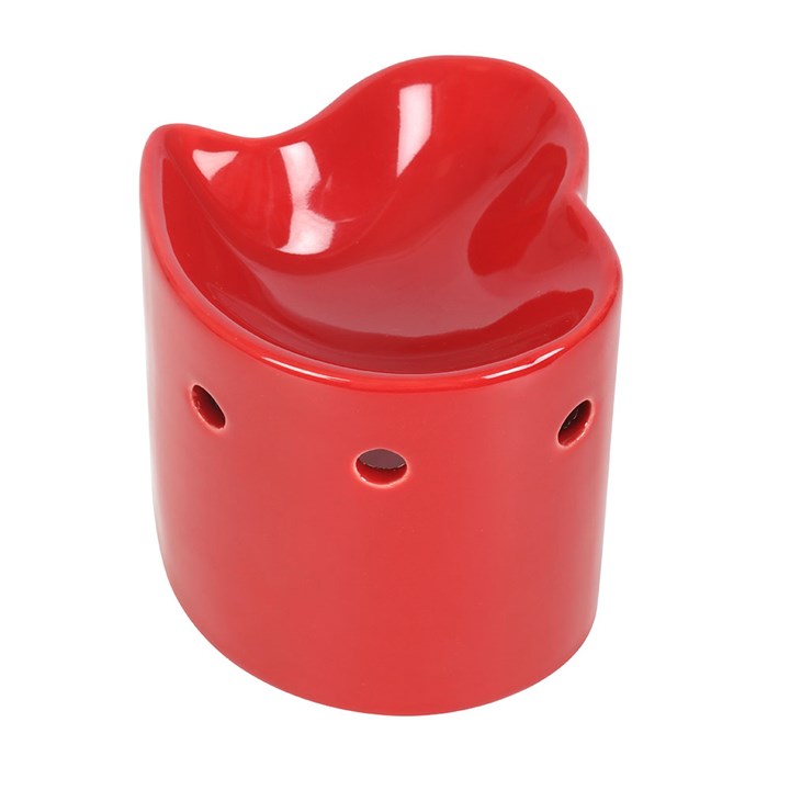 Red ceramic heart-shaped oil burner and wax warmer, perfect for creating a romantic ambiance with essential oils or wax melts. Stylish and functional home fragrance accessory.