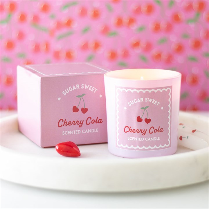 Sugar Sweet Cherry Cola scented candle in a pink glass jar with a retro cherry-themed label, packaged in a matching decorative box, perfect for adding a sweet and nostalgic touch to your space