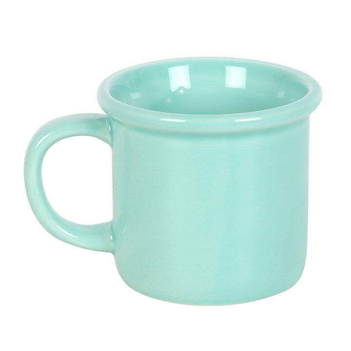 Mint green ceramic mug featuring a happy face design on the front and an uplifting 'You are so loved' message inside the rim, perfect for brightening your day or as a thoughtful gift