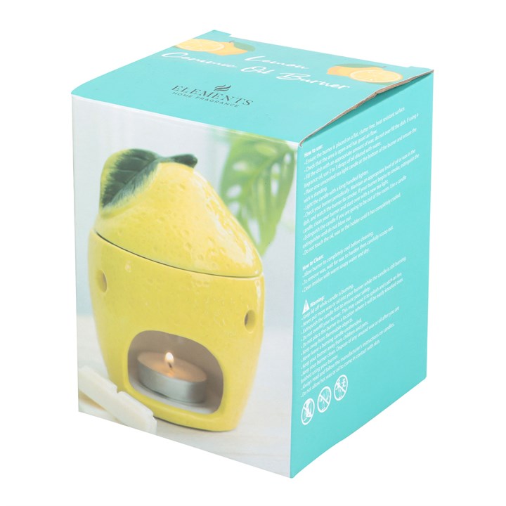 Bright yellow ceramic lemon oil burner with a textured surface and lemon slice design on top, perfect for melting wax or diffusing essential oils to create a refreshing ambiance