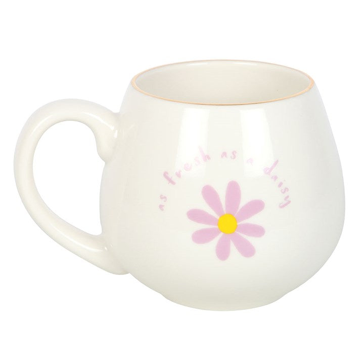 White ceramic mug with 'As fresh as a daisy' text and a purple daisy design with a yellow center. Perfect for tea or coffee, adding a touch of floral charm to your daily routine.