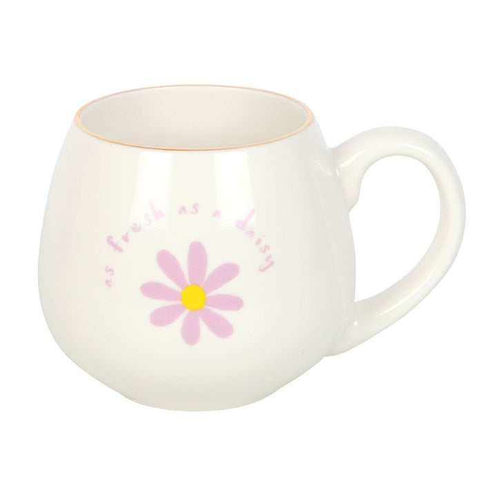 White ceramic mug with 'As fresh as a daisy' text and a purple daisy design with a yellow center. Perfect for tea or coffee, adding a touch of floral charm to your daily routine.