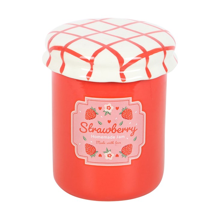 A strawberry jam-themed oil burner and wax warmer designed to look like a vintage jam jar, featuring a glossy red finish, a white ceramic lid with a red crisscross pattern, and a charming strawberry label.