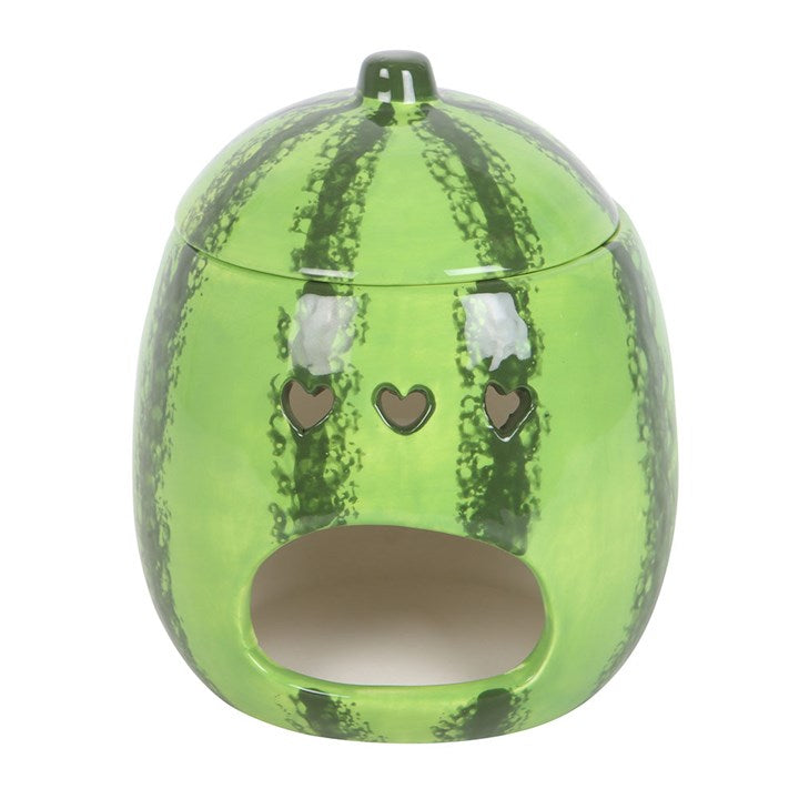 A beautifully designed watermelon-shaped scented candle housed in a glossy ceramic jar with a removable lid resembling a watermelon rind.