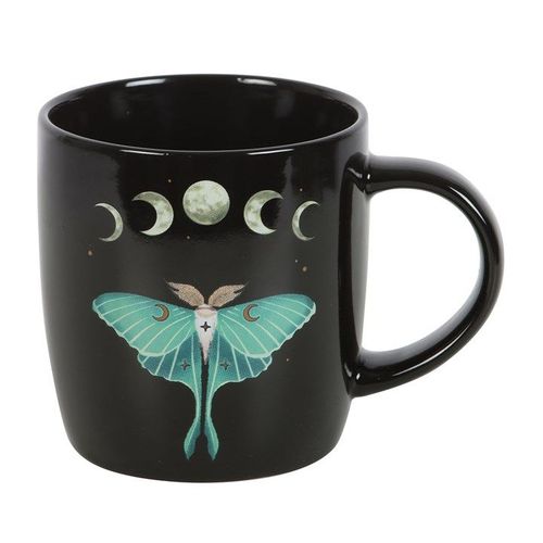 A glossy black ceramic mug featuring a detailed illustration of a teal luna moth, surrounded by moon phases, stars, and floral accents. The design evokes a mystical, nature-inspired aesthetic.