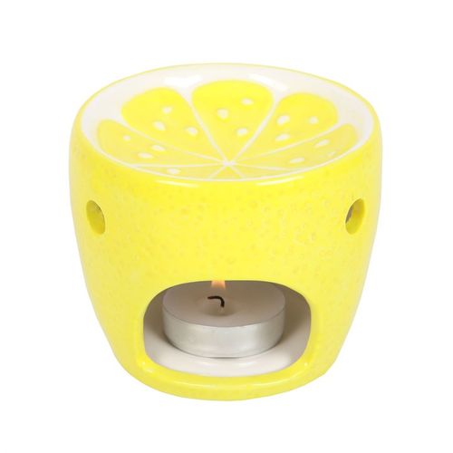 Bright yellow ceramic lemon oil burner with a textured surface and lemon slice design on top, perfect for melting wax or diffusing essential oils to create a refreshing ambiance