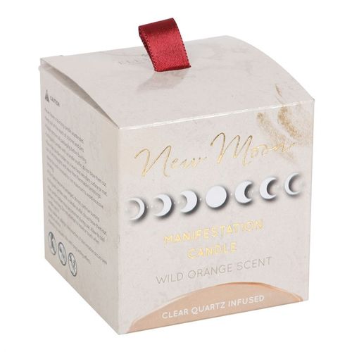 New Moon Wild Orange Manifestation Candle with Clear Quartz, featuring a frosted glass jar, copper lid, and elegant gold moon detail. Perfect for setting intentions and creating a calming atmosphere.