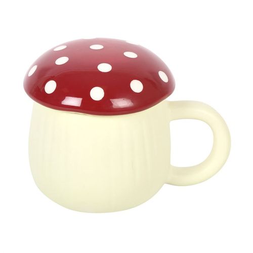 A novelty ceramic mug shaped like a mushroom, with a cream-colored base and a glossy red lid topped with white polka dots. The design mimics a toadstool, giving it a playful, whimsical look.