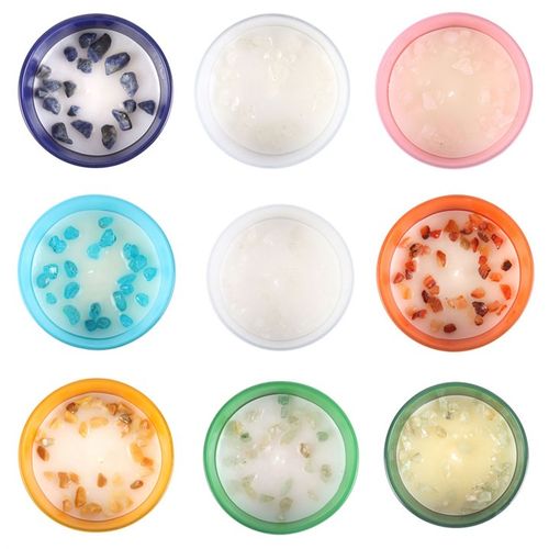 Set of 12 zodiac gemstone candles, each featuring a unique color, gemstone, and fragrance tailored to each zodiac sign, with cork lids and matching decorative boxes