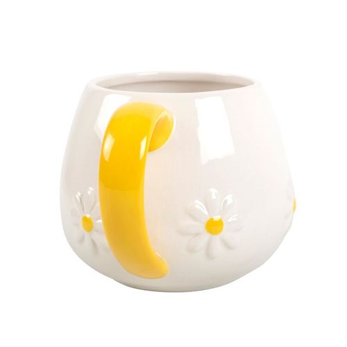 White ceramic mug with embossed daisy flower details and a vibrant yellow handle, perfect for adding a touch of cheer to your coffee or tea moments