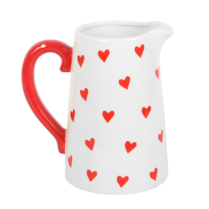 Heart Print Ceramic Flower Vase with a white base, red heart pattern, and a vibrant red handle. Perfect for displaying fresh flowers or as a decorative centerpiece for your home.