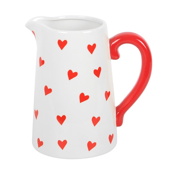 Heart Print Ceramic Flower Vase with a white base, red heart pattern, and a vibrant red handle. Perfect for displaying fresh flowers or as a decorative centerpiece for your home.
