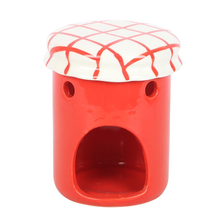 A strawberry jam-themed oil burner and wax warmer designed to look like a vintage jam jar, featuring a glossy red finish, a white ceramic lid with a red crisscross pattern, and a charming strawberry label.