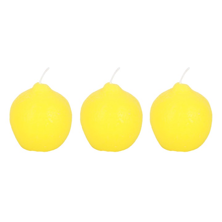A set of three unscented, lemon-shaped candles with a smooth, glossy texture, placed on a wooden board. The candles have a bright yellow hue and white wicks, resembling real lemons