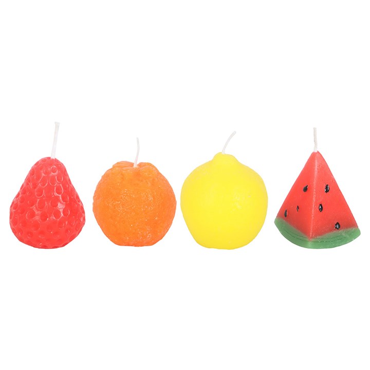 A set of four unscented, fruit-shaped candles—strawberry, lemon, watermelon, and orange—arranged on a wooden board. Each candle has a realistic texture and vibrant color, creating a fun and decorative display. 