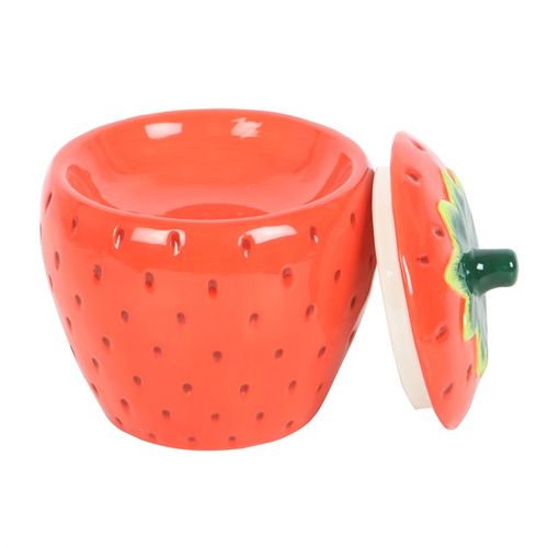 A ceramic strawberry-shaped oil burner with a removable lid, featuring a glossy red finish with tiny seed details and a green leafy top. The playful and vibrant design makes it a charming addition to any home décor.